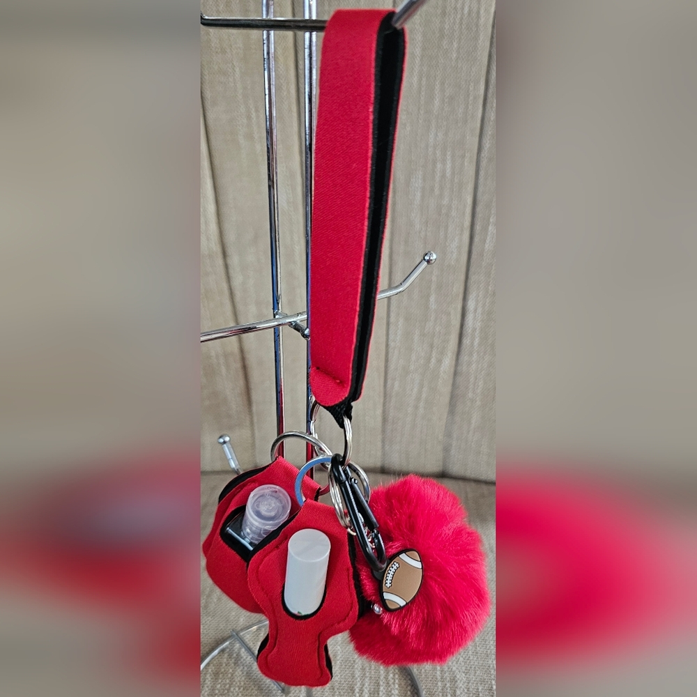 Red Football Keychain with Pom Pom Peach Lip Care And Sanitizer Include. New